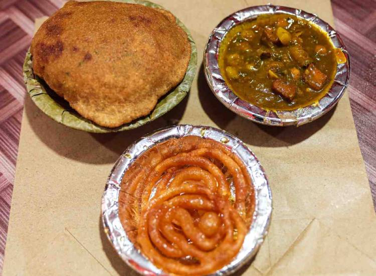 Street food vendor frying kachori